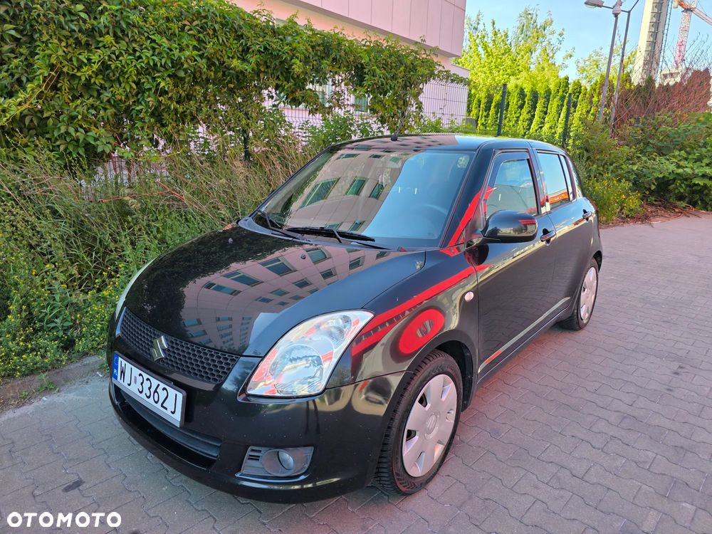 Suzuki Swift 1.3 GS / Premium - 1
