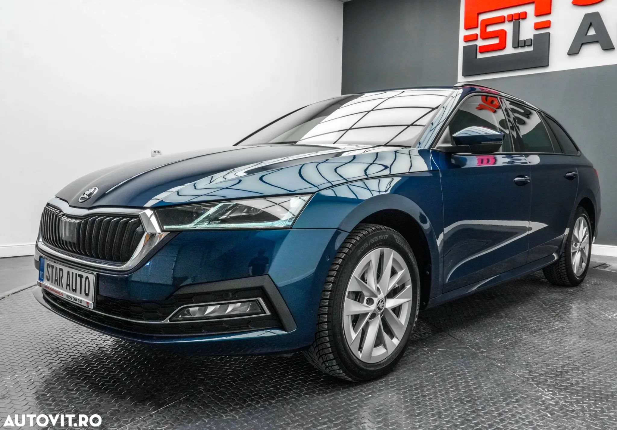 Skoda Octavia Combi 2.0 TDI DSG Style - 1