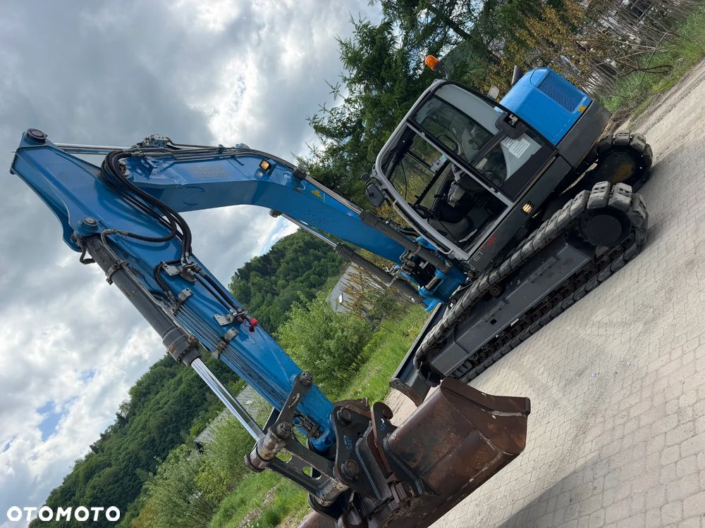 Wacker Neuson ET145 Koparka Gąsienicowa 15 ton. Maszyna jak Nowa 2018 rok. 3400Mtg silnik PERKINS. Maszyna Pełny Oryginał. Aktualna DEKRA BMWT oraz aktualne serwisy Eksploatacyjne! Sprowadzona z Norwegii, KLIMA, KAMERY, własna pompa tankowania, Nagłośnienie, Zero luzów i wycieków! OKAZJA. Szybkozłącze Hydrauliczne. Skrętne ramię. Dodatkowe linie hydrauliczne! 2 łyżki - 15