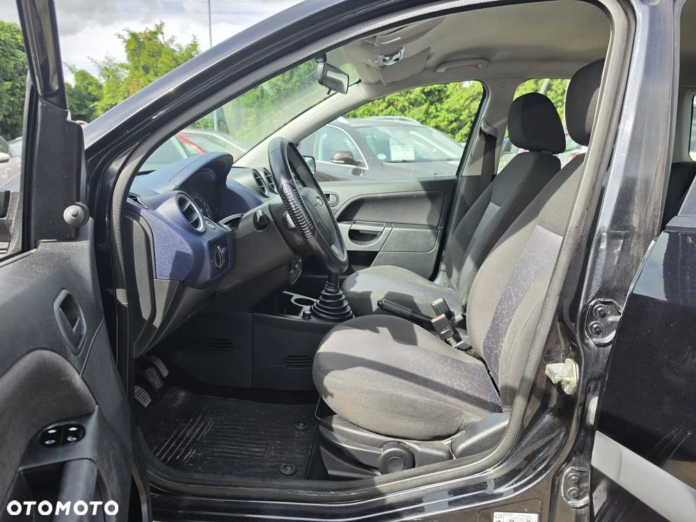 Ford Fiesta 1.4 Ghia - 11