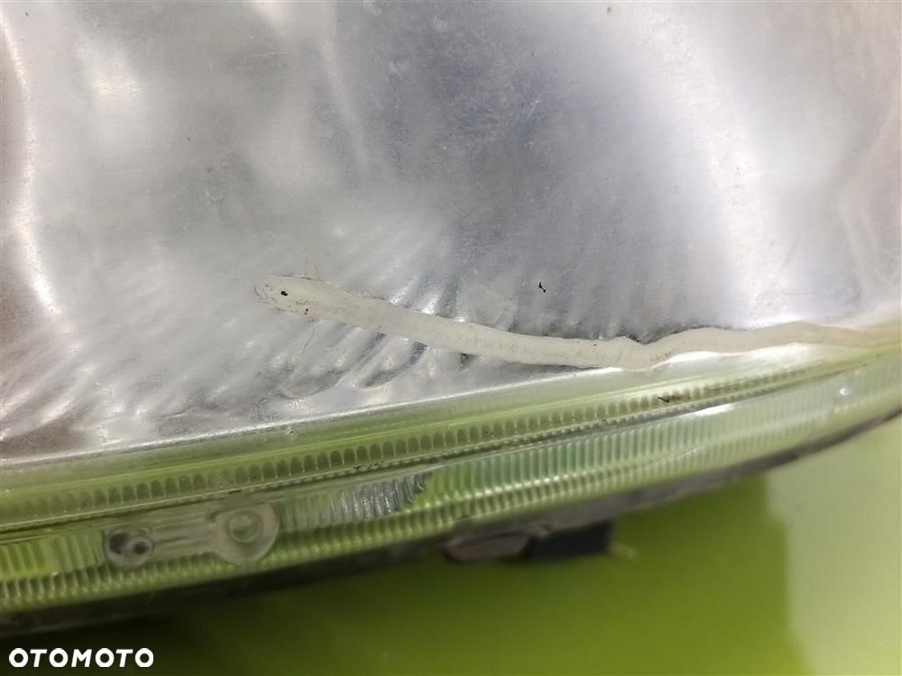 Reflektor lampa przód lewa Mitsubishi Lancer VII 2003-2011 - 2