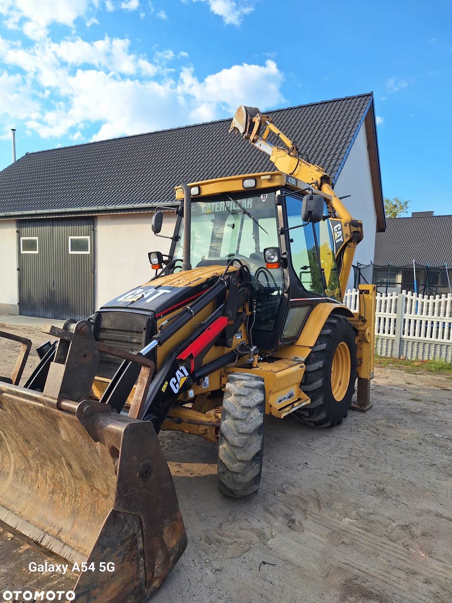 Caterpillar 428D - 1
