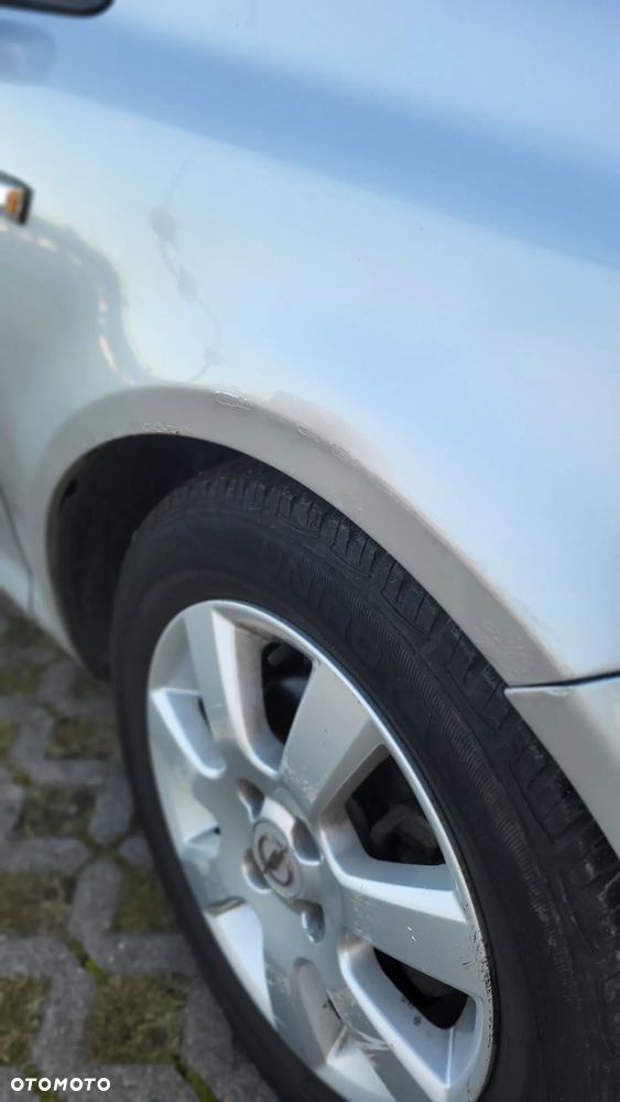 Opel Corsa 1.4 16V Enjoy - 11