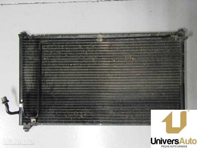 RADIADOR DE AR CONDICIONADO NISSAN VANETTE 2.3 D CARGO - 1