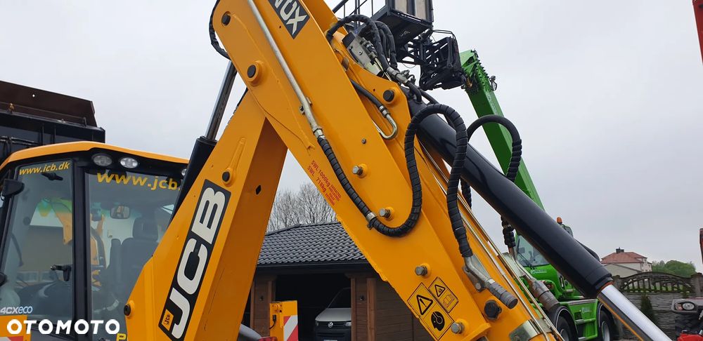 JCB 4CX eco STAN IDEALNY!! TYLKO 5920MTG/ rok 2013 /TORQUELOCK/DŻOJSTIKI/POWERSLIDE - 31