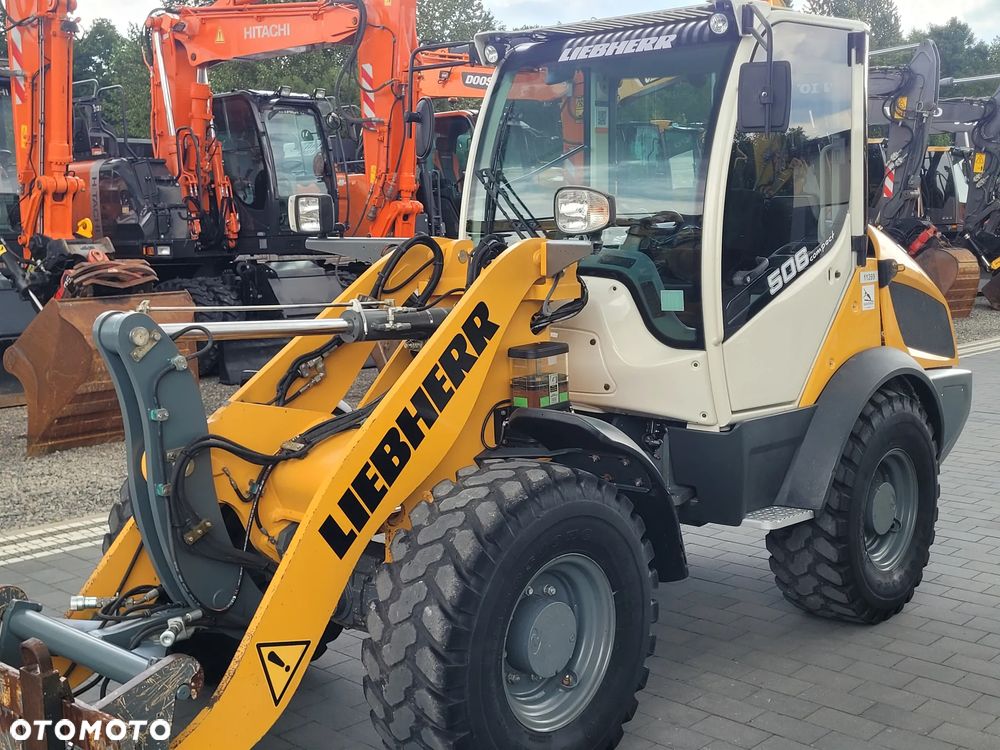 Liebherr L 506 C / widły + łyżka otwierana / centralne smarowanie / - 12