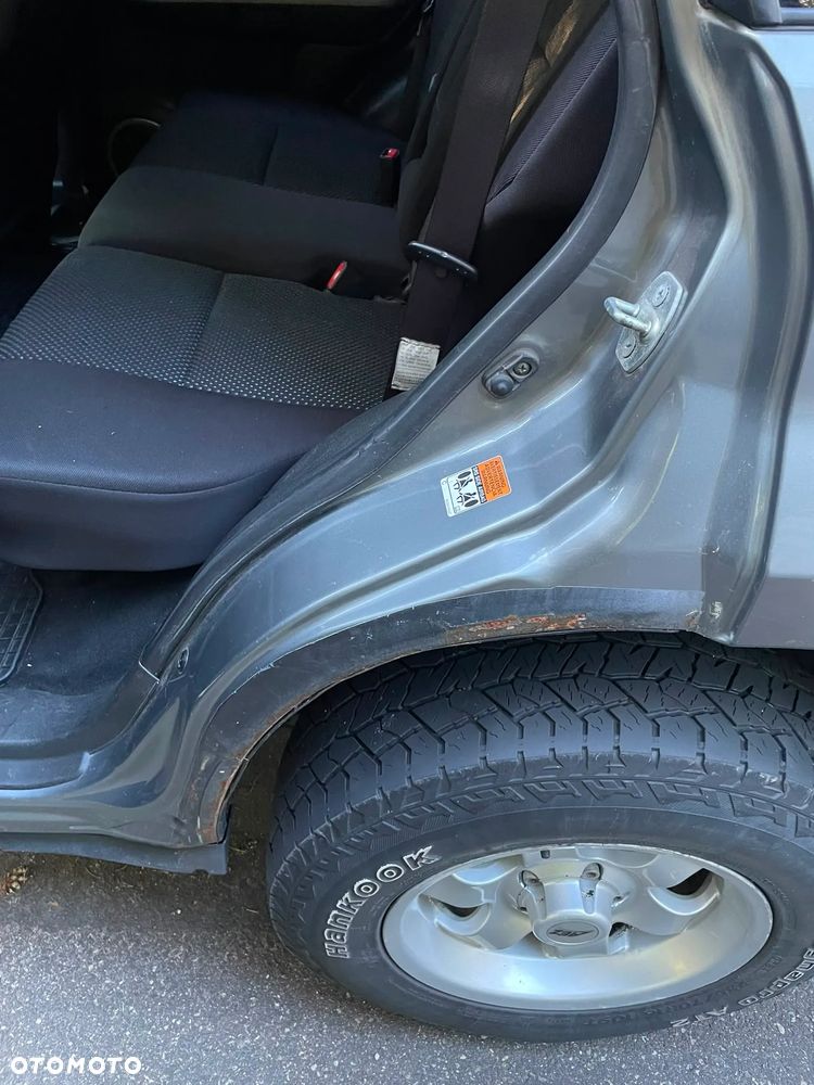Suzuki Grand Vitara 2.0 - 9