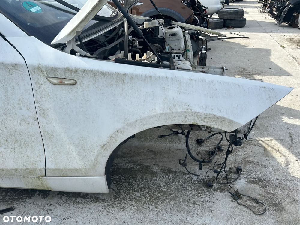 BŁOTNIK PRAWY PRZÓD BMW E87 - 1