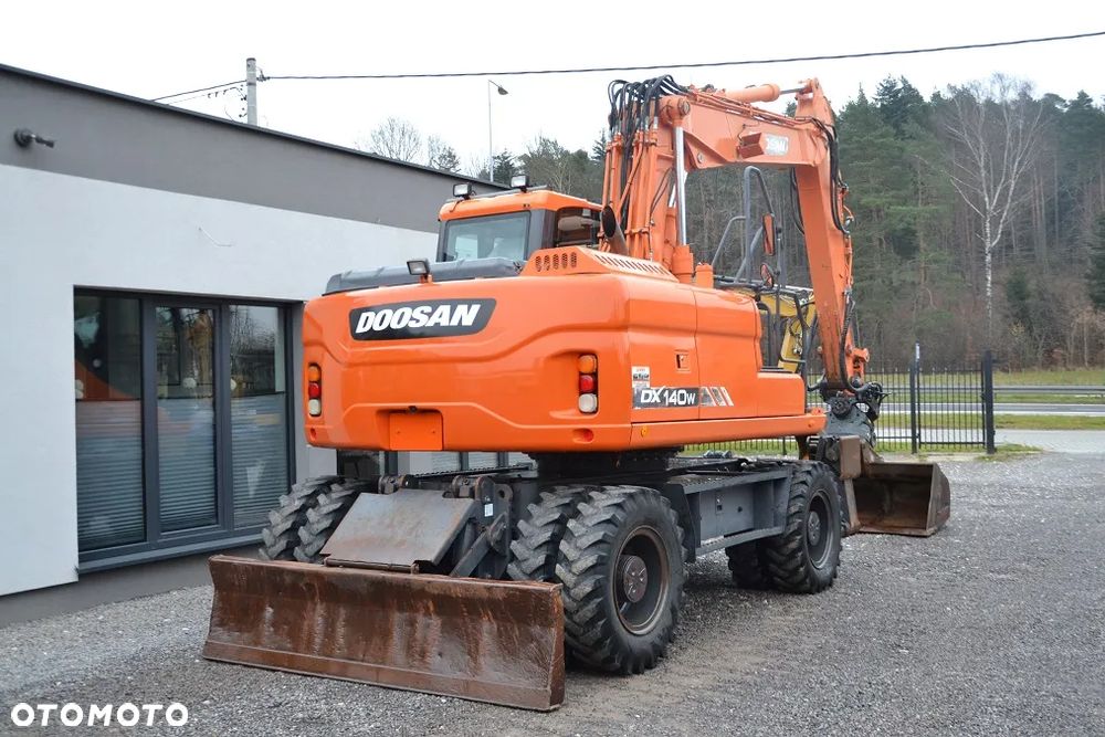 Doosan DX 140 W - 9