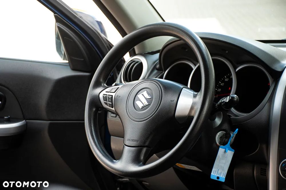 Suzuki Grand Vitara 2.0 Comfort + - 12
