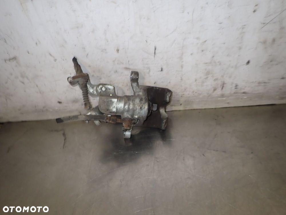 ZACISK HAMULCA LEWY TYŁ MAZDA 6 - 2