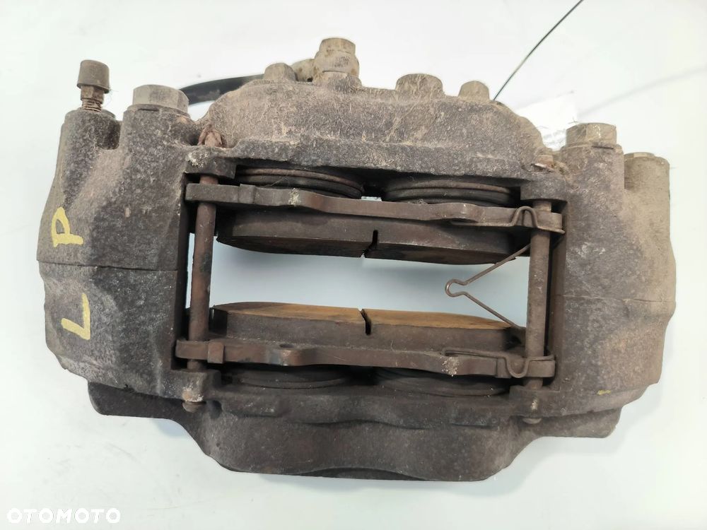 Zacisk hamulcowy prawy/lewy przód Mitsubishi Pajero 2008 SUV Diesel 147kW 3200cm³ - 6