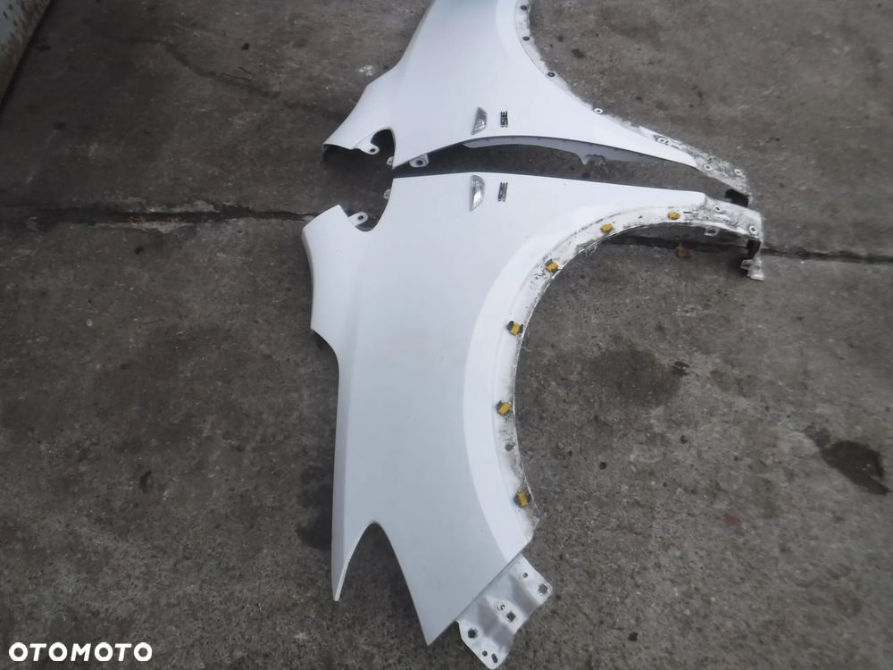 Opel  Mokka 12-16 blotnik przod lewy prawy GAZ bialy - 10