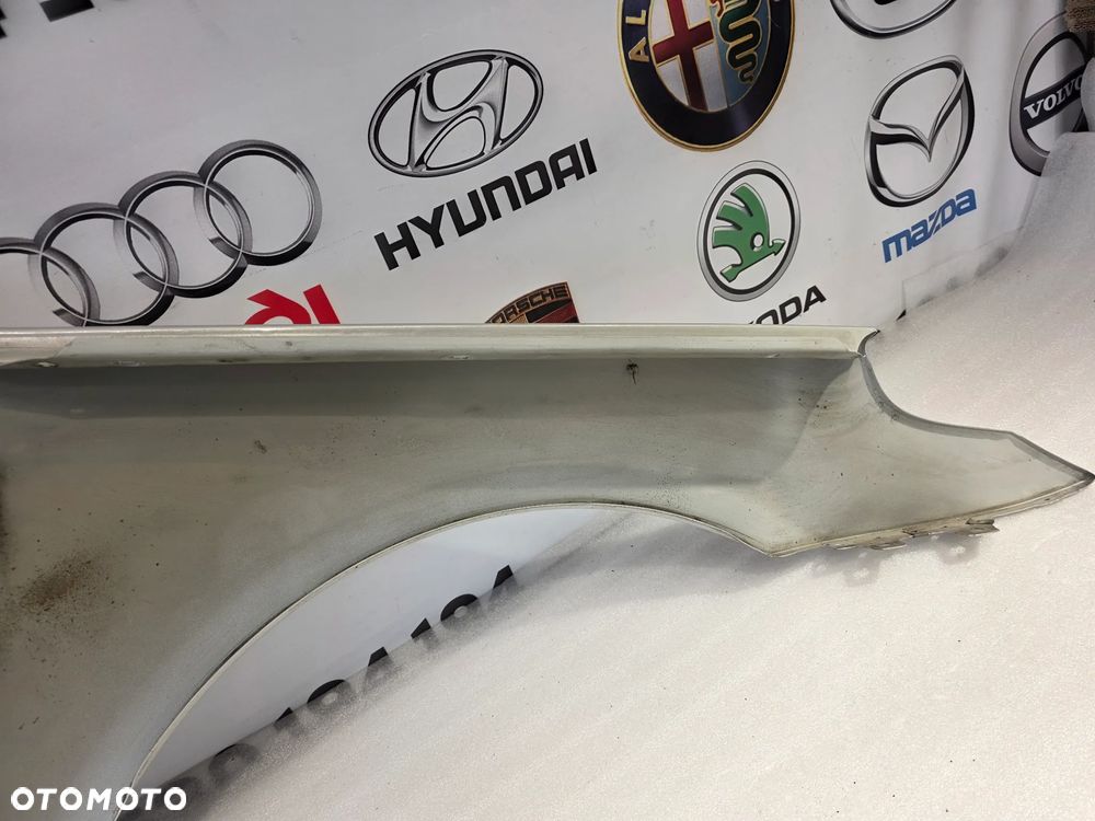 BMW E60 / E61 LEWY BŁOTNIK PRZEDNI PRZÓD NR AUKCJI BŁ232 - 24