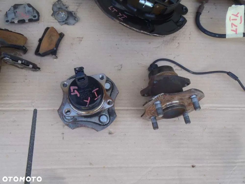 piasta łożysko abs tył toyota yaris I 1 II III wersja pod tarcze jak nowe - 2