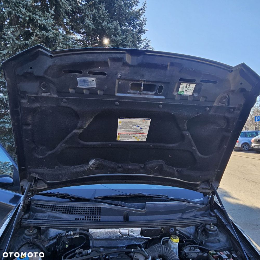 Fiat Stilo 1,6 B 76 kW / 103 KM (2003 kombi) (kod lak: 675) pojazd na części: maska, zderzak, drzwi, szyby, lusterka, chłodnica ... - 2