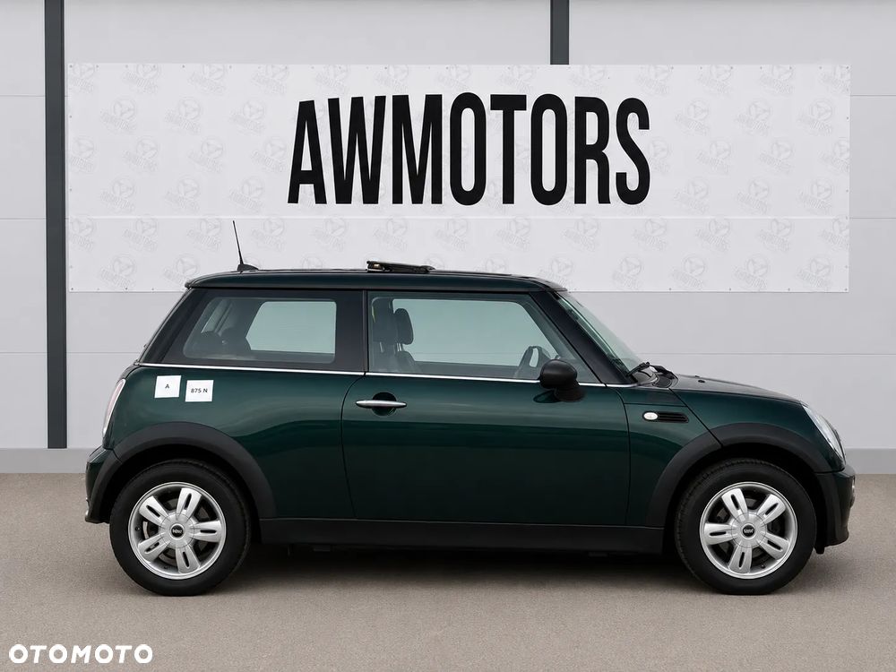 MINI COOPER 2005 *SAMOCHÓD NA CZĘŚCI* 875 N BRITISH RACING GREEN (895) MASKA, LAMPA, DRZWI, LUSTERKO, ZDERZAK, GRILL, BŁOTNIK, KLAPA, BELKA, DESKA, FOTELE, KANAPA, ĆWIARTKA KIEROWNICA, TARCZE, ZACISKI, ZAWIESZENIE, KOMPLETNY PRZÓD, KOMPLETNY TYŁ, LICZNIK, ZEGARY, PRAWE LEWE PRZÓD TYŁ - 1