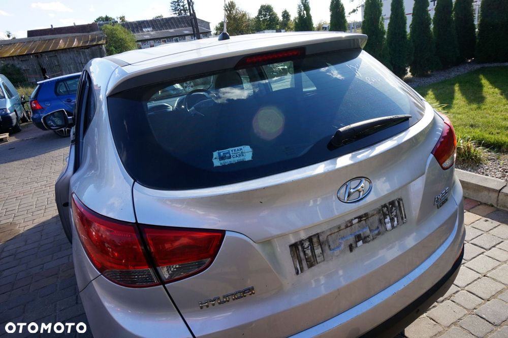KLAPA BAGAŻNIKA TYLNA IX35 I  RAH  SREBRNY HYUNDAI 2009-2015 - 2