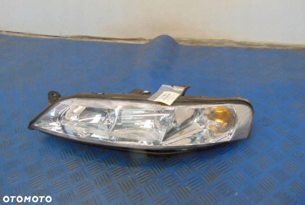 OPEL VECTRA B REFLEKTOR LEWY - 1