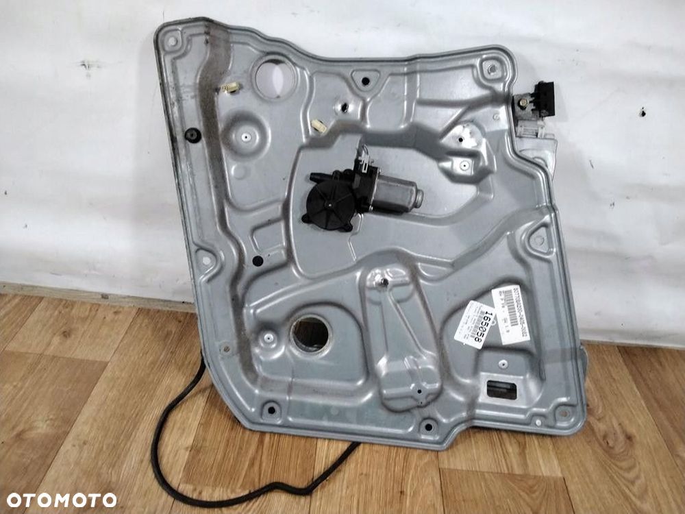 nissan primera p12 podnośnik szyby prawy przód - 1
