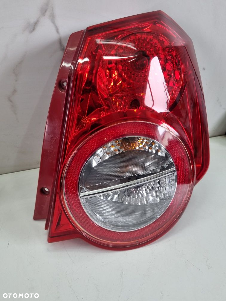 chevrolet aveo T250 lampa tylna prawa prawy tył pasażera oryginał - 4
