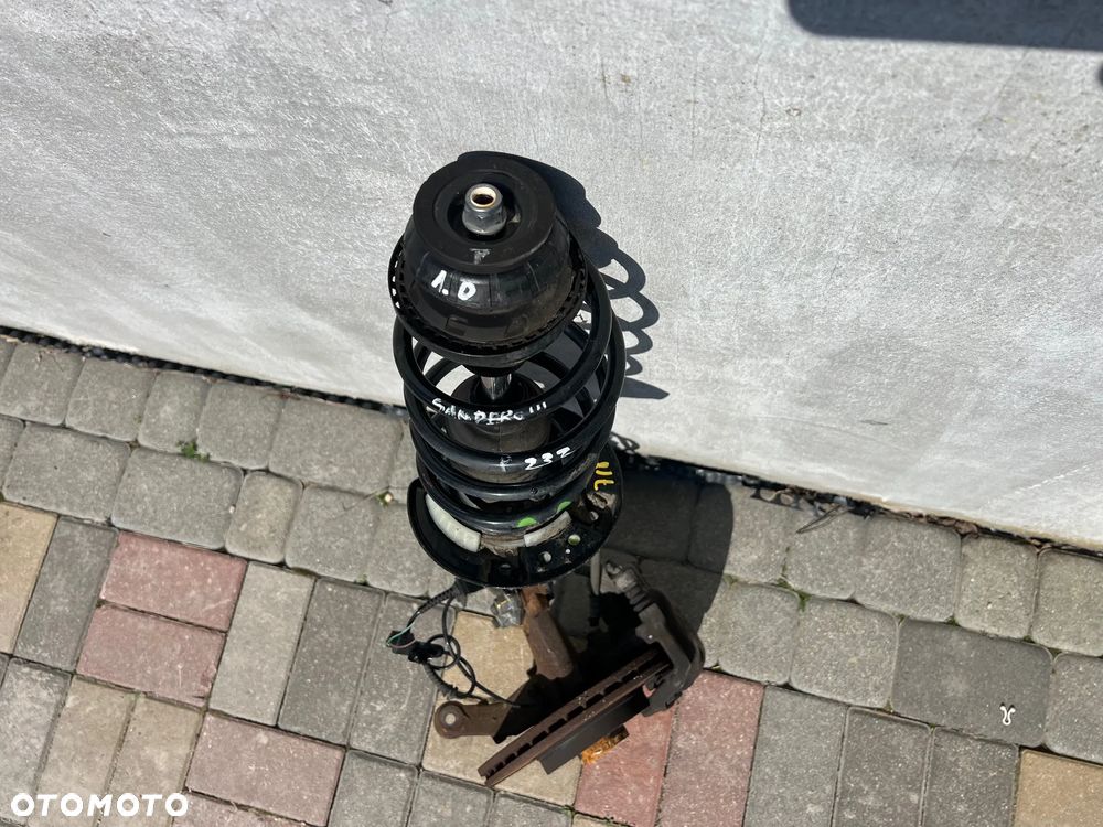 MCPERSON MACPERSON MAKPERSO ZWROTNICA PIASTA AMORTYZATOR ZACISK PRZÓD PRZEDNIA PRAWA PRAWY DACIA SANDERO STEPWAY III 23 ZĘBY 1.0 TCE - 2