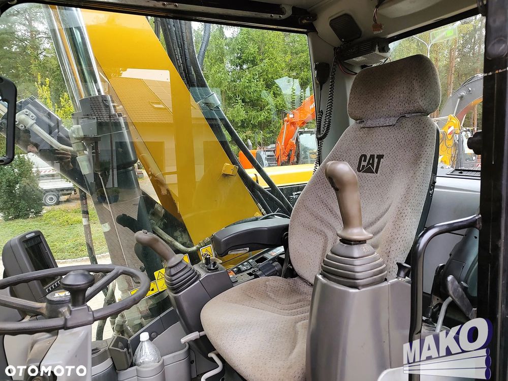 Caterpillar M313D - 10