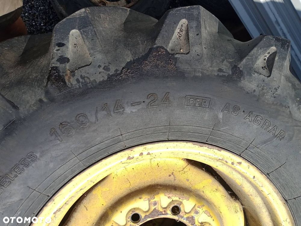 OPONA UŻYWANA PRZÓD KOMBAJN 16.9/14 -24 JOHN DEERE - 4