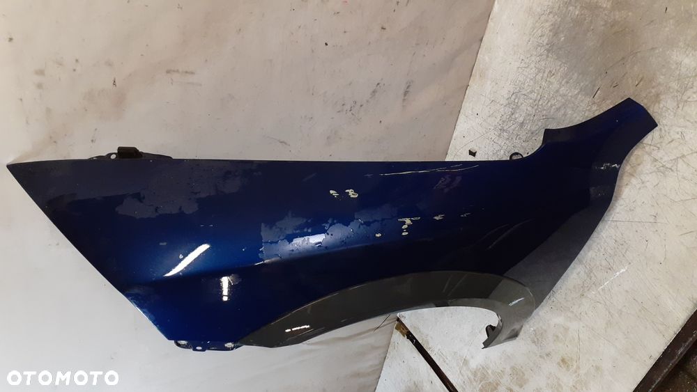 * SKODA OCTAVIA II 2 SCOUT BŁOTNIK PRZÓD PRZEDNI LEWY GRANATOWY - 2