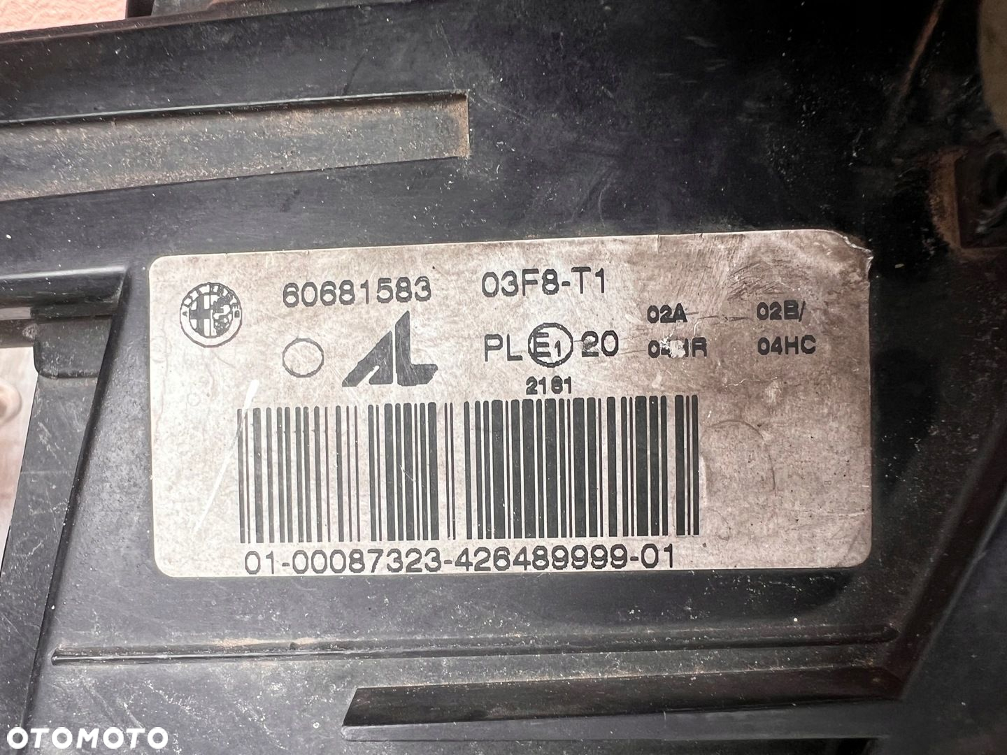 Lampa przednia ALFA ROMEO GT KOMPLET CZARNE EUROPA ORYGINALNE AL - 8