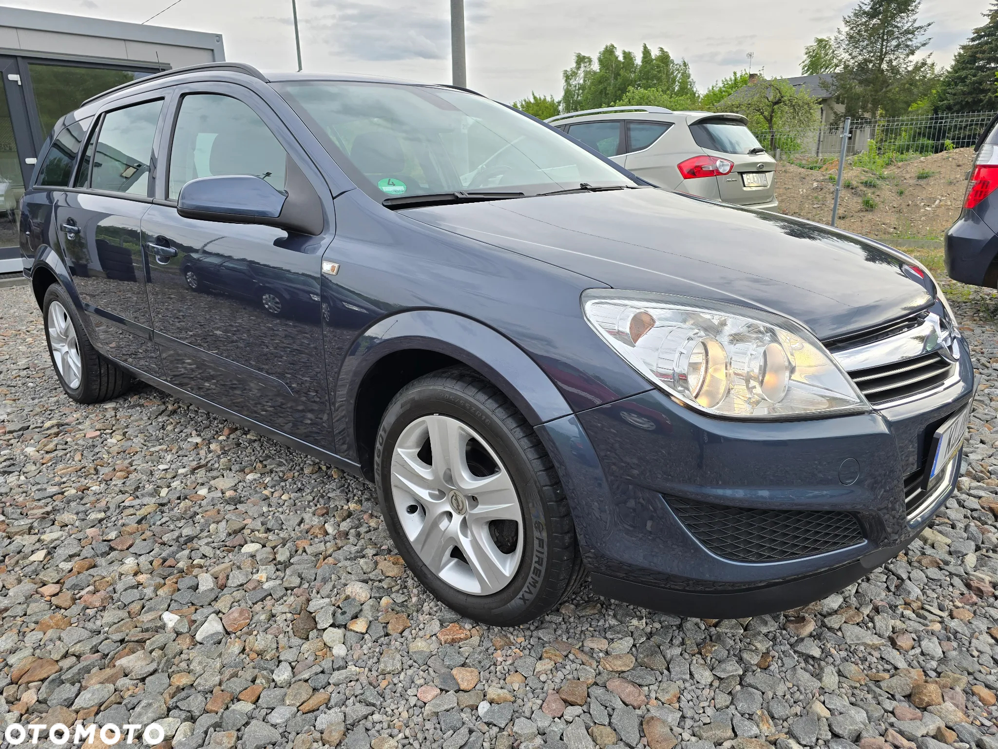 Opel Astra 1.6 Caravan Sport - 13
