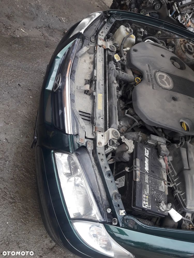 Mazda 626 GF GW 97-02 LIFT    Maska lampa zderzak pas atrapa 18J - 7