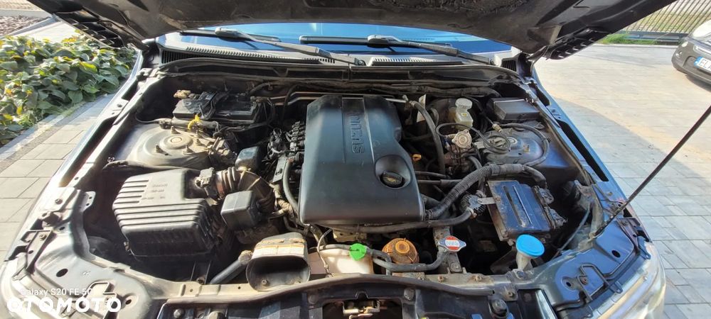 Suzuki Grand Vitara 2.4 De Luxe - 13