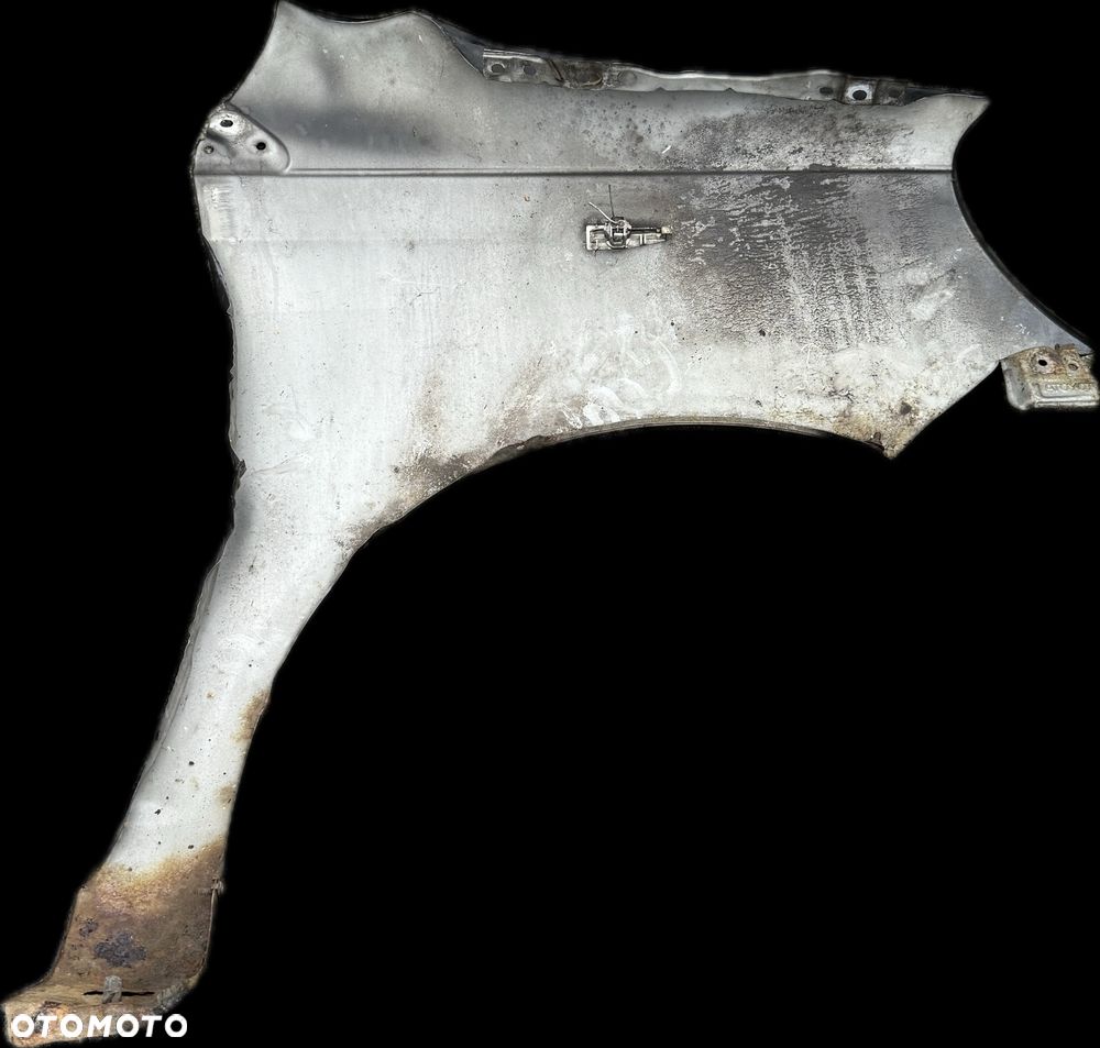 BŁOTNIK lewy Przód Przedni Toyota Yaris I 1 - 2