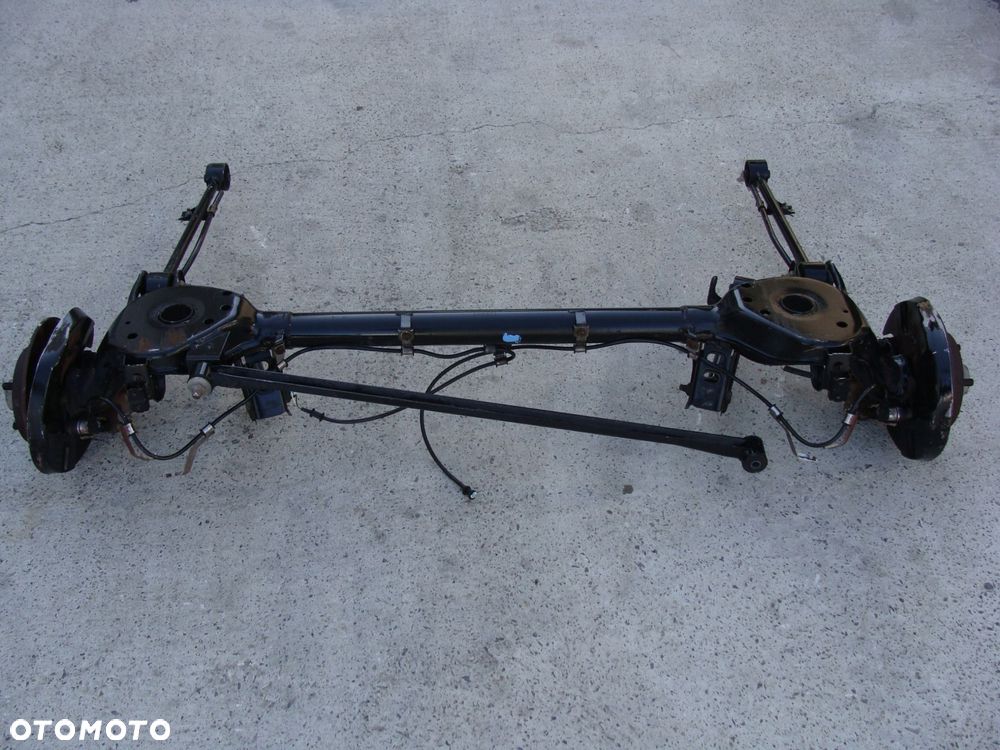 oś tylna belka zawieszenia micra k11 abs tarcza zacisk !!! - 7