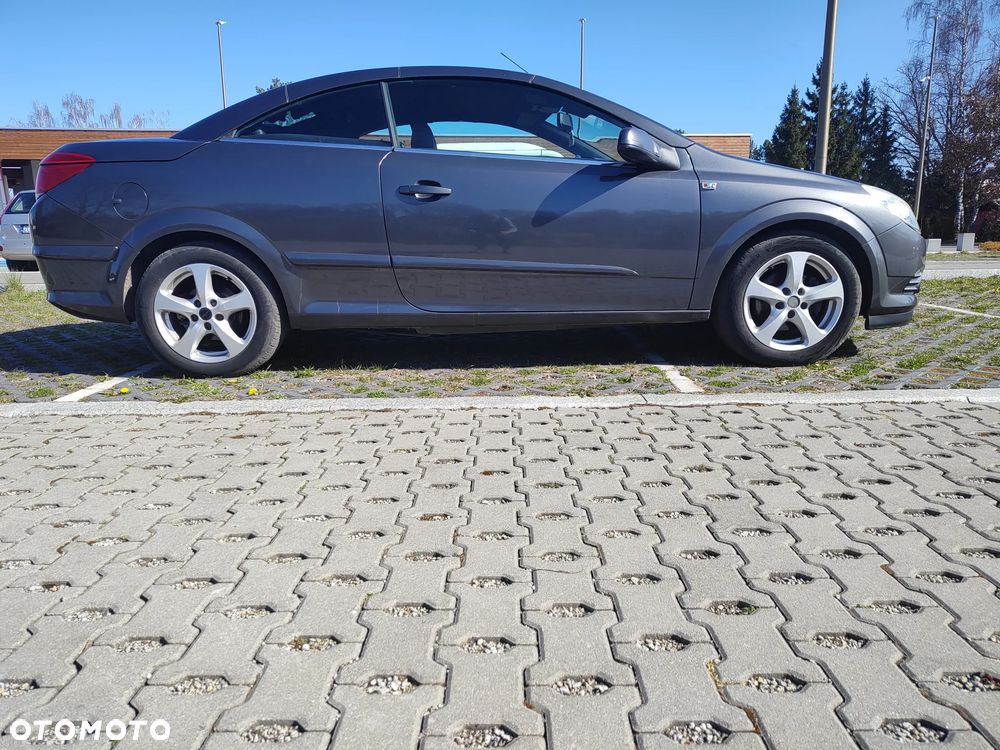 Opel Astra 1.6 Cosmo - 11