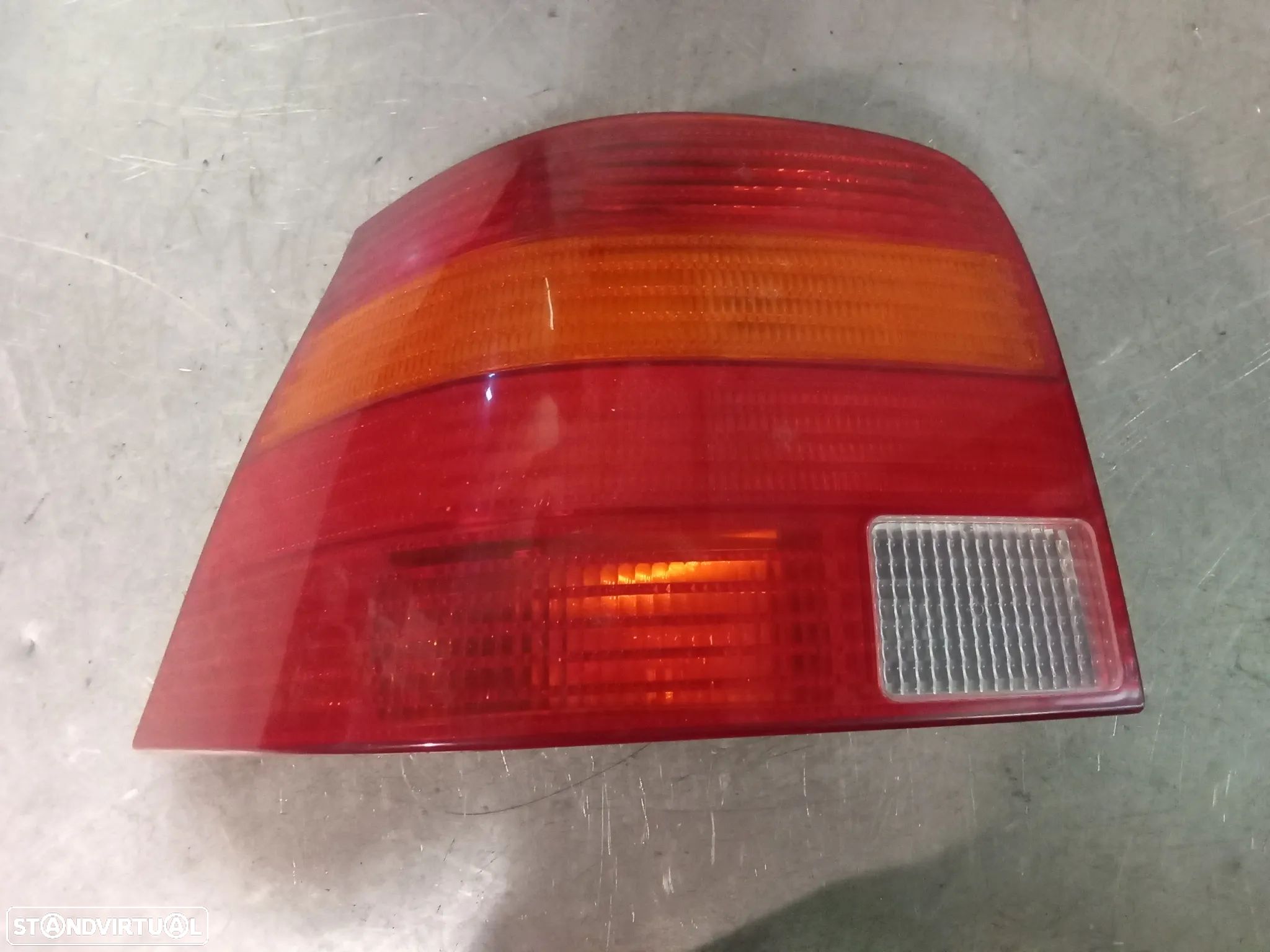 FAROLIM VOLKSWAGEN GOLF IV - ESQUERDO - 1