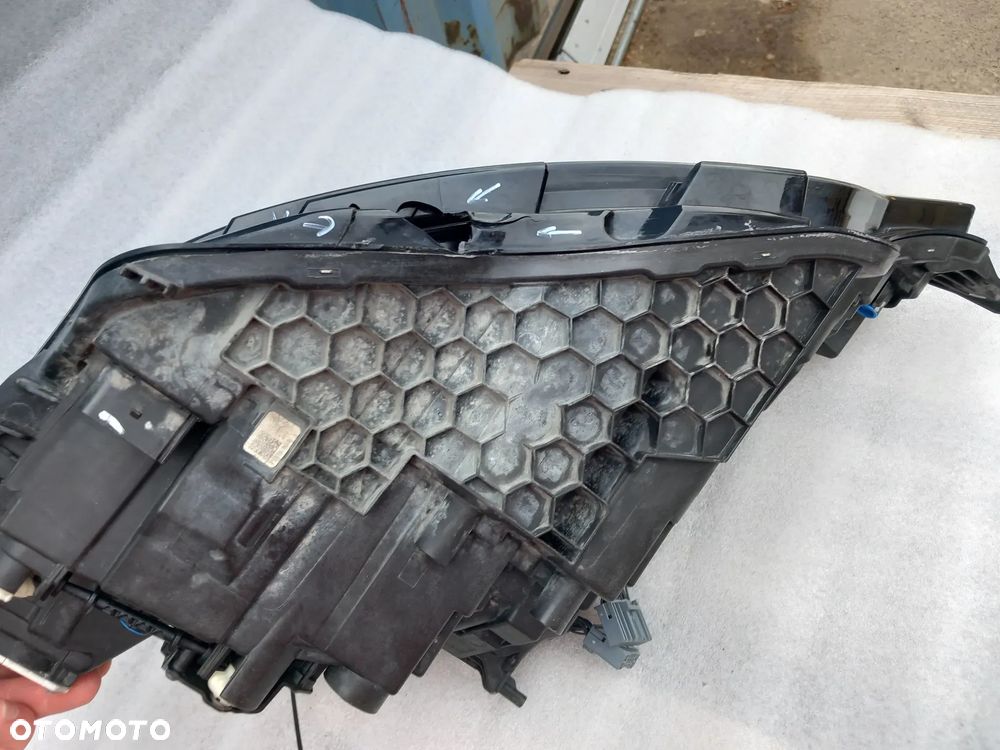 Lampa VOLVO V60 S60 przód/przednia prawa OE AECY6 - 14