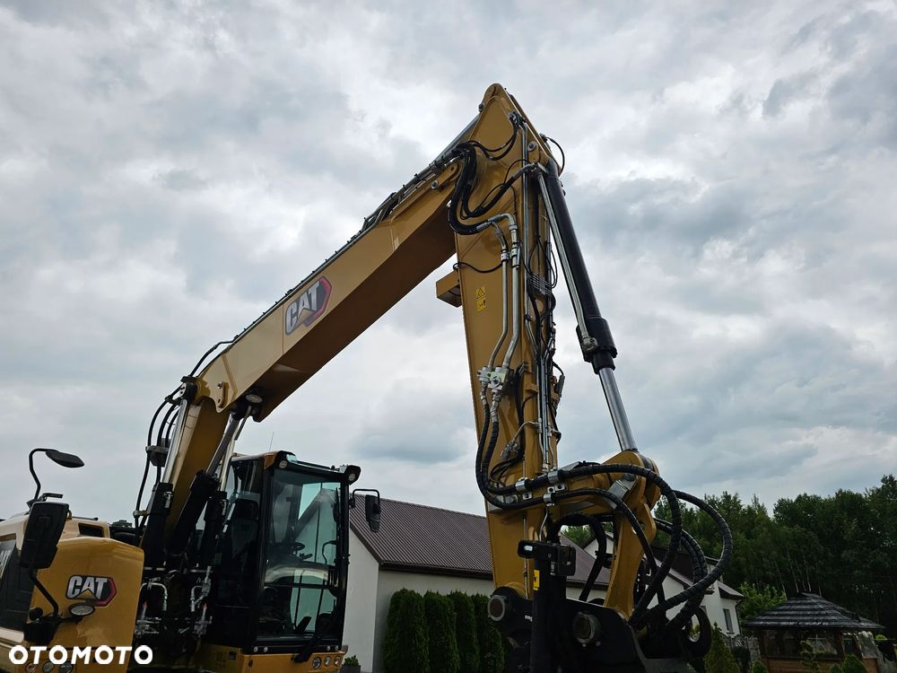 Caterpillar M 318 F - 24