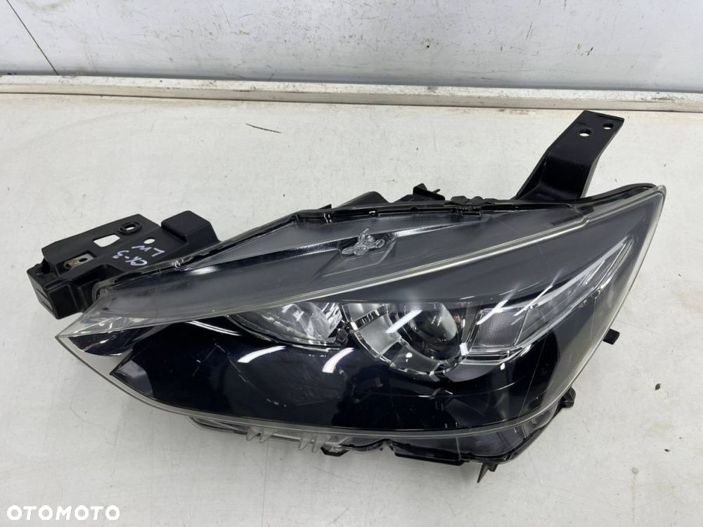 Lampa reflektor Mazda CX3 CX-3 14-21r. lewa przednia SOCZEWKA lewy przód zwykła d10e-51040 - 14