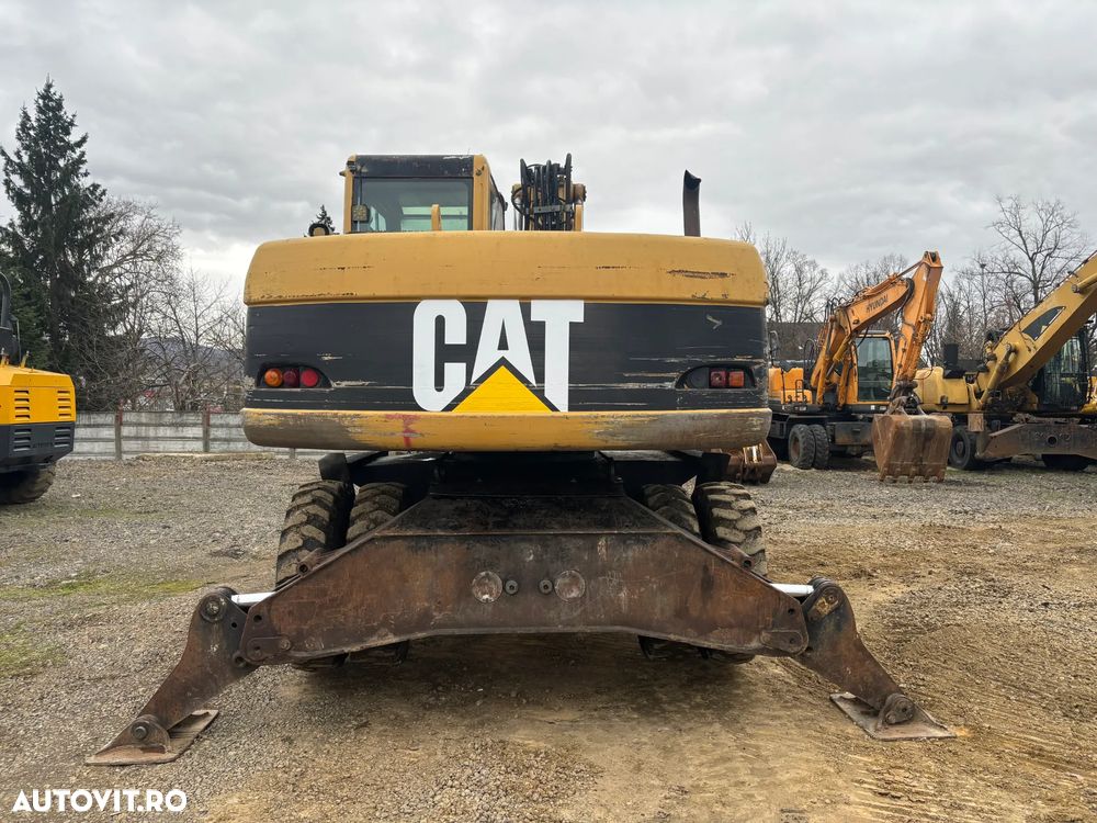 Caterpillar M316C - 8