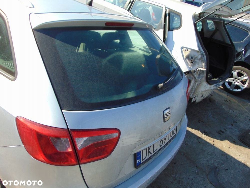 LAMPA LEWA TYŁ TYLNIA W BŁOTNIK SEAT IBIZA 6J IV LS7Y KOMBI - 1