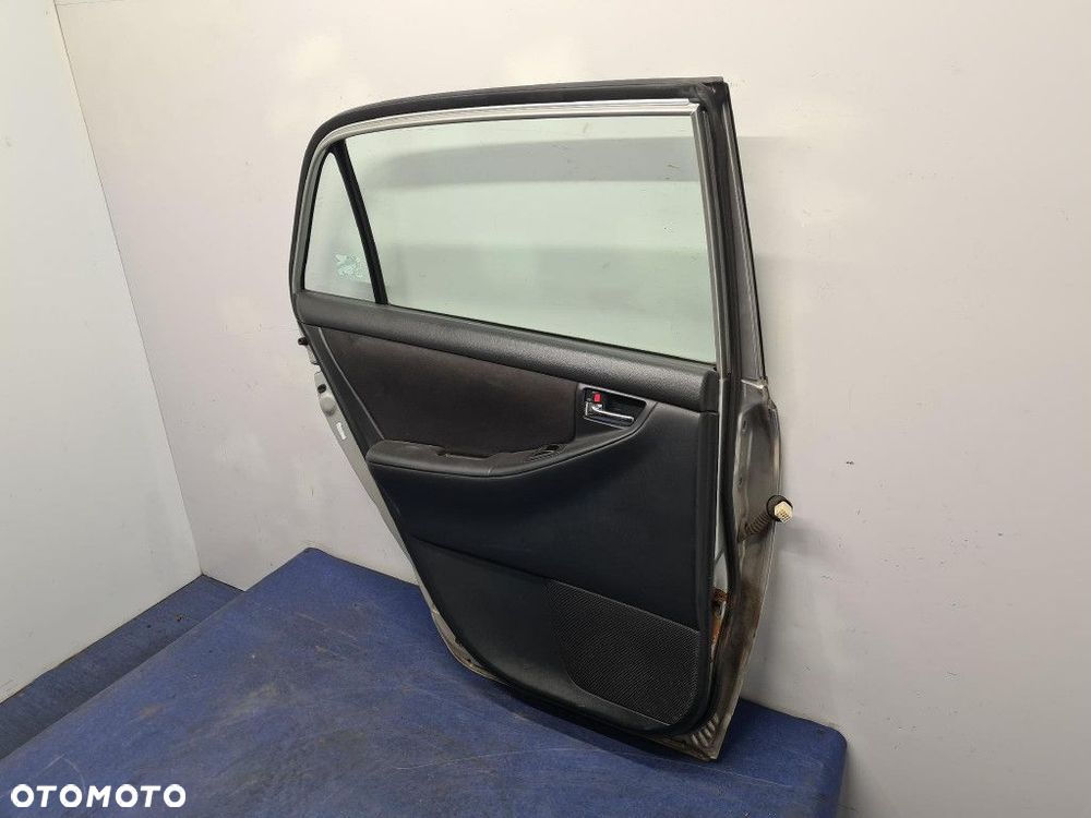 TOYOTA COROLLA E12 1.4 D-4D DRZWI TYŁ LEWE 1C0 - 10