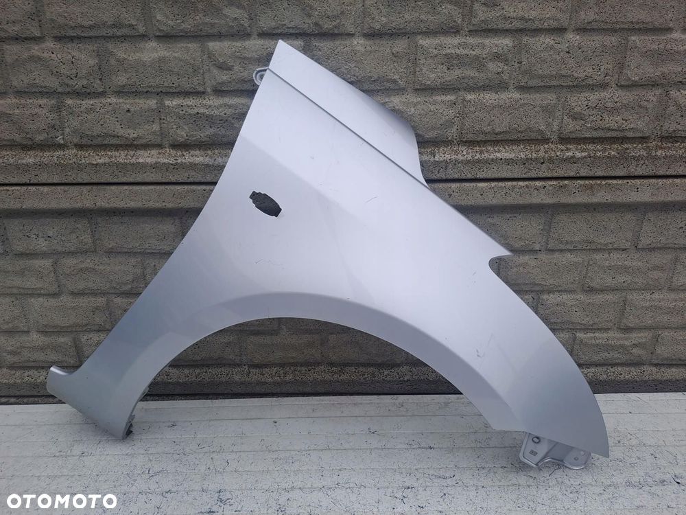 SUZUKI SWIFT Mk7 10-17 BŁOTNIK PRZEDNI PRAWY ORYGINAŁ - 1
