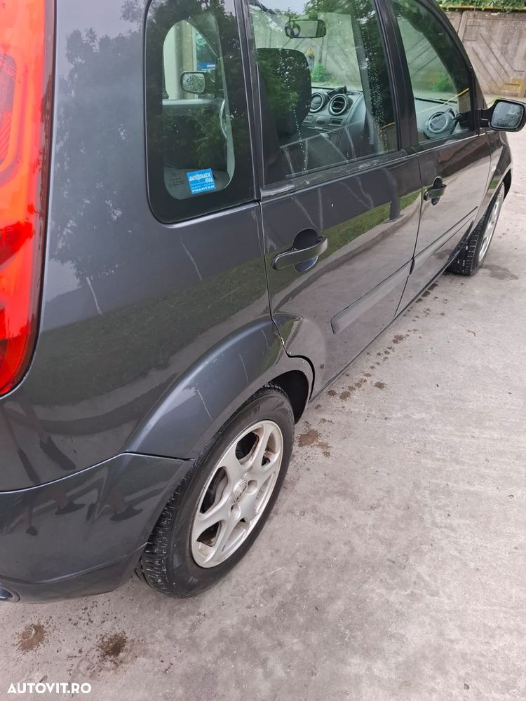 Ford Fiesta 1.4 TDCI Ghia - 11