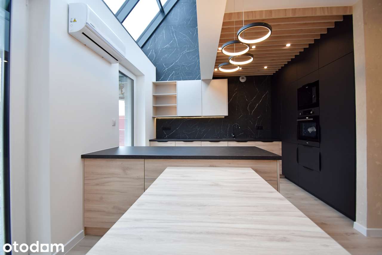 Luksusowy apartament dwupoziomowy z dużym tarasem i windą
