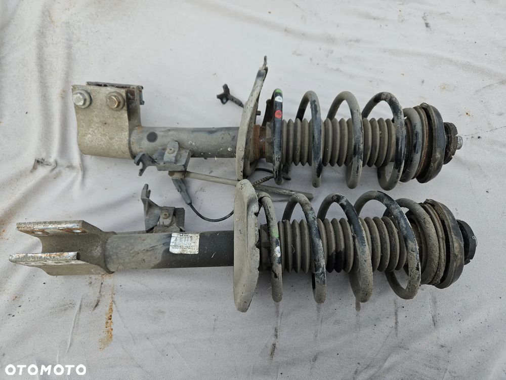 Amortyzator sprezyna McPherson lewy przód Peugeot 3008 I 1,6 THP 2011r 70 tys. km 7043 - 2