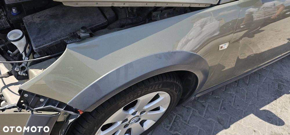 BŁOTNIK LEWY  INSIGNIA A LIFT  COUNTRY TOURER Z30W - 1