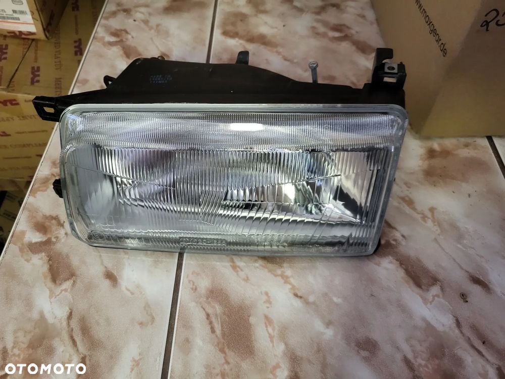 Reflektor Skoda  FELICIA ST LEWY DPA po 98- - 2