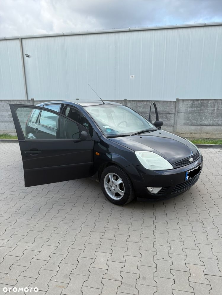 Ford Fiesta 1.4 Ghia - 10